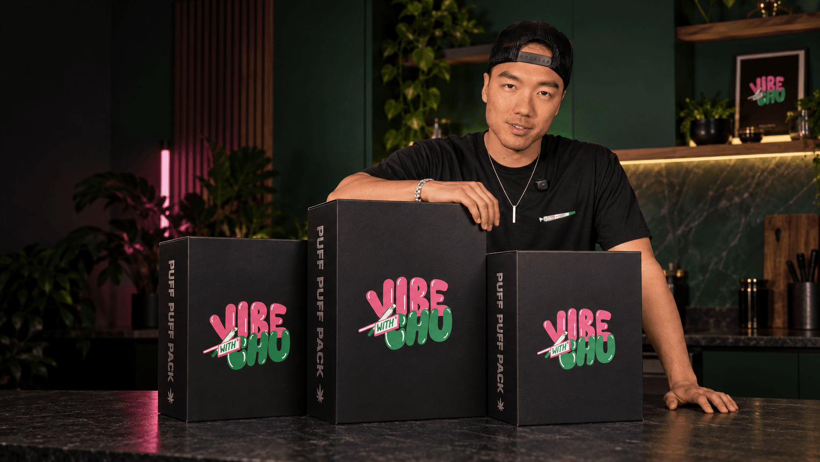 Jerry with three Vibe with Chu Puff Puff Pack boxes