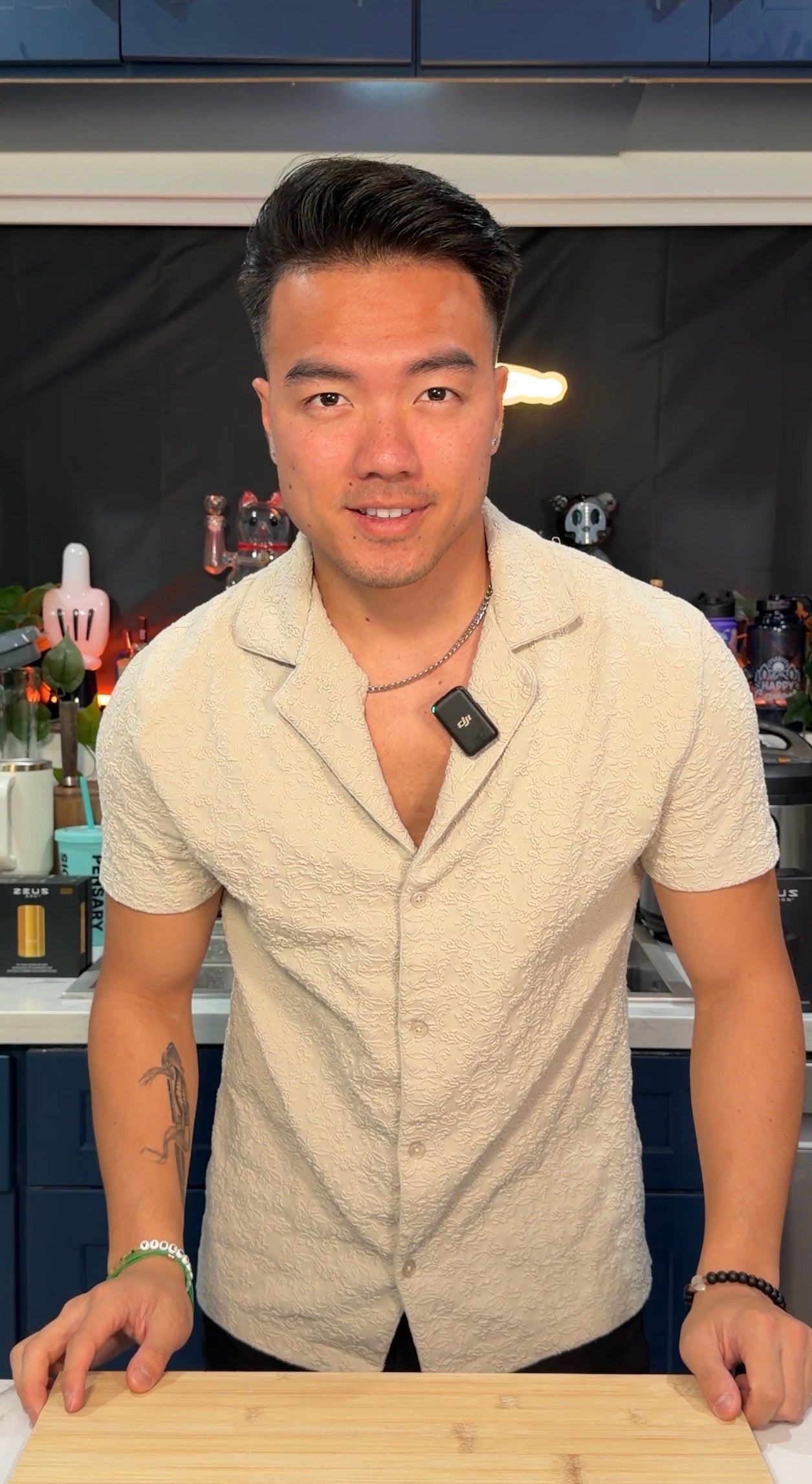 Jerry, founder of VibeWithChu, in his studio kitchen